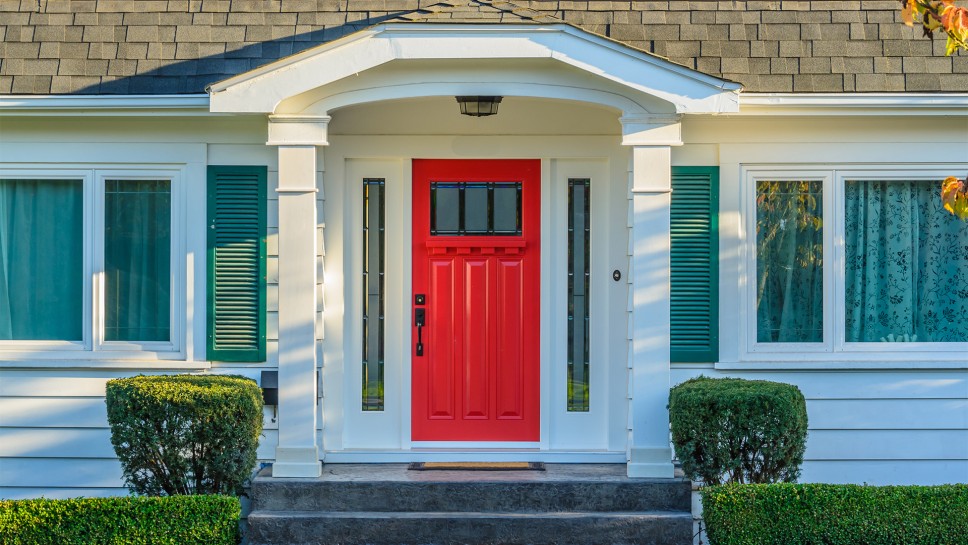 an entry door colored red